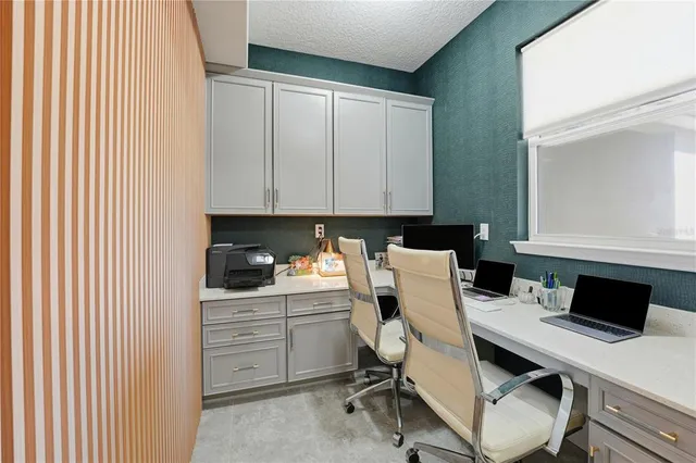 a bathroom with a double vanity sink mirror and shower