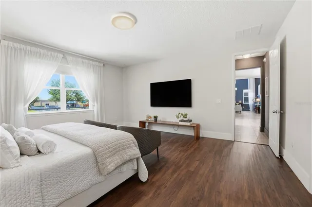 a bathroom with a bathtub and toilet