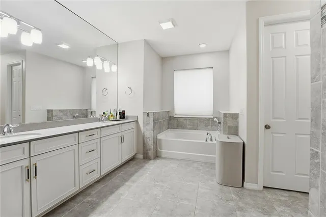 a view of a livingroom with furniture and a window