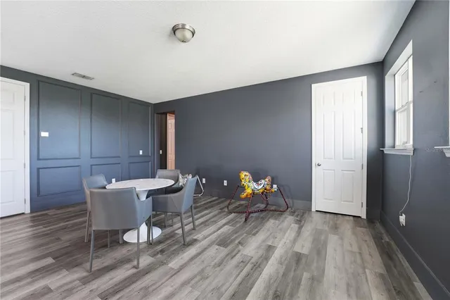 a en suite bathroom with a sink and a mirror