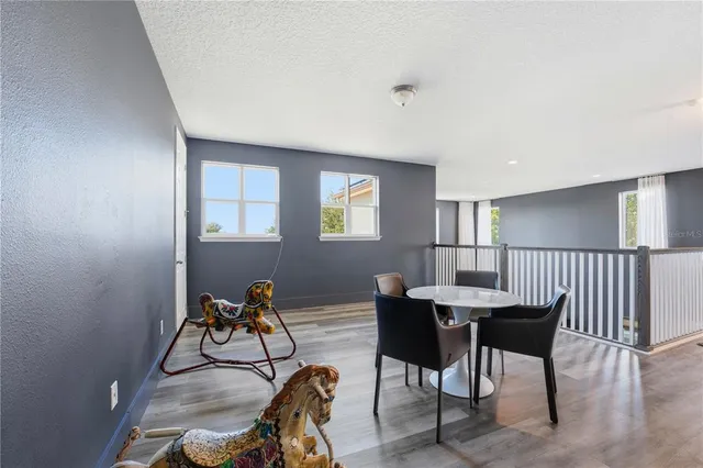 a bedroom with bed and a couch