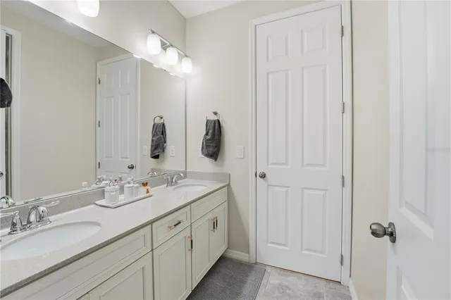 an aerial view of a house with yard swimming pool and outdoor seating