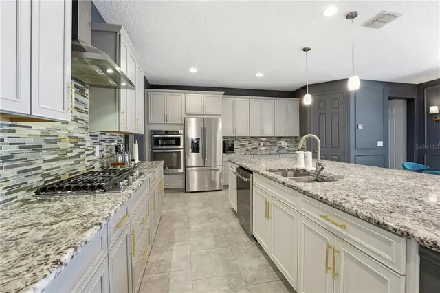 a living room with furniture and white walls