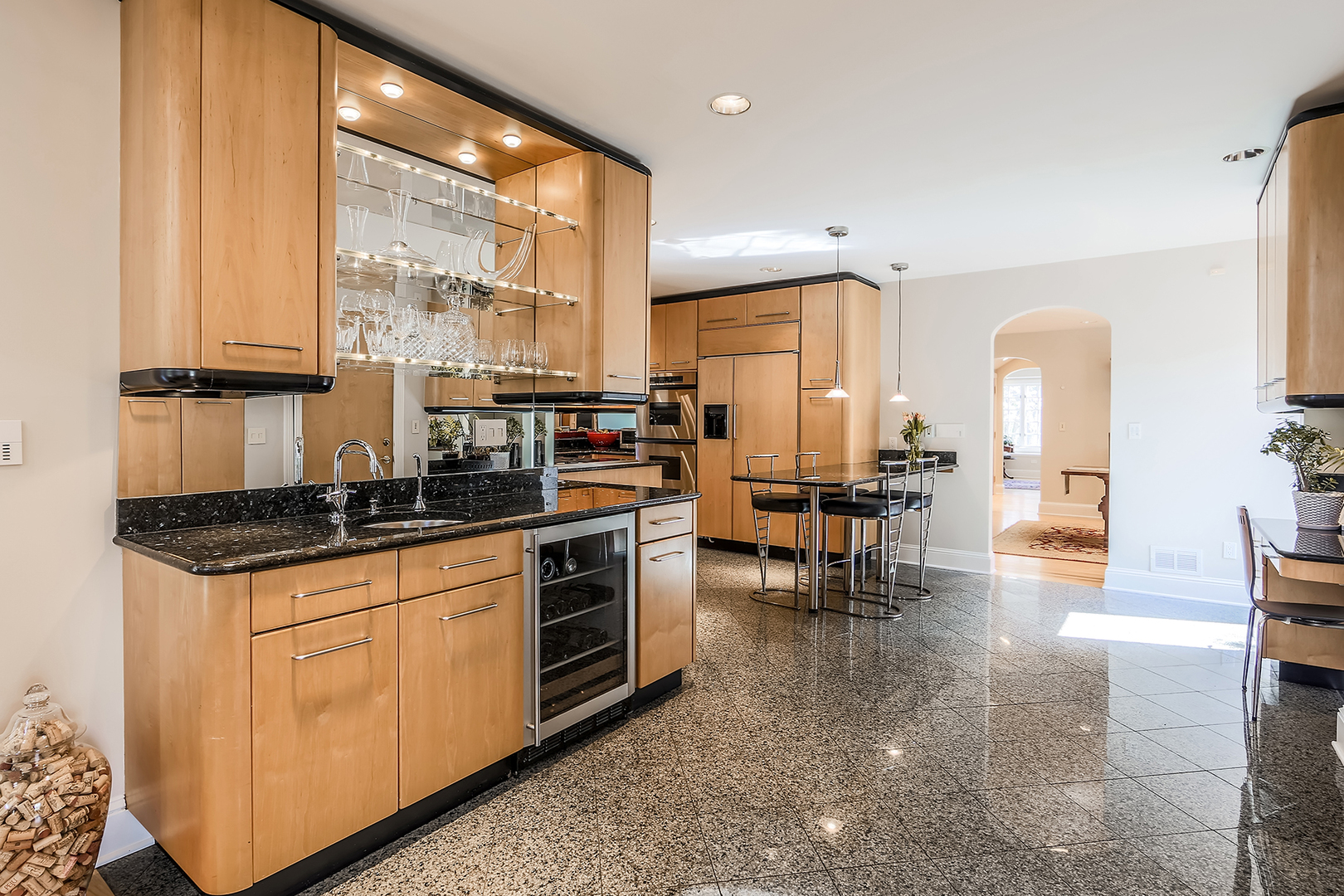 212 Stanley Avenue Park Ridge, IL 60068 - Photo 11 of 33 a kitchen with sink a counter and chairs