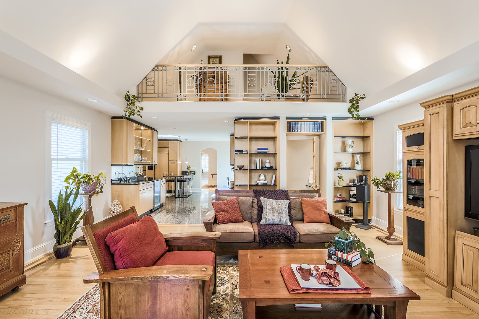 212 Stanley Avenue Park Ridge, IL 60068 - Photo 14 of 33 a living room with furniture a bookshelf and a wooden floor