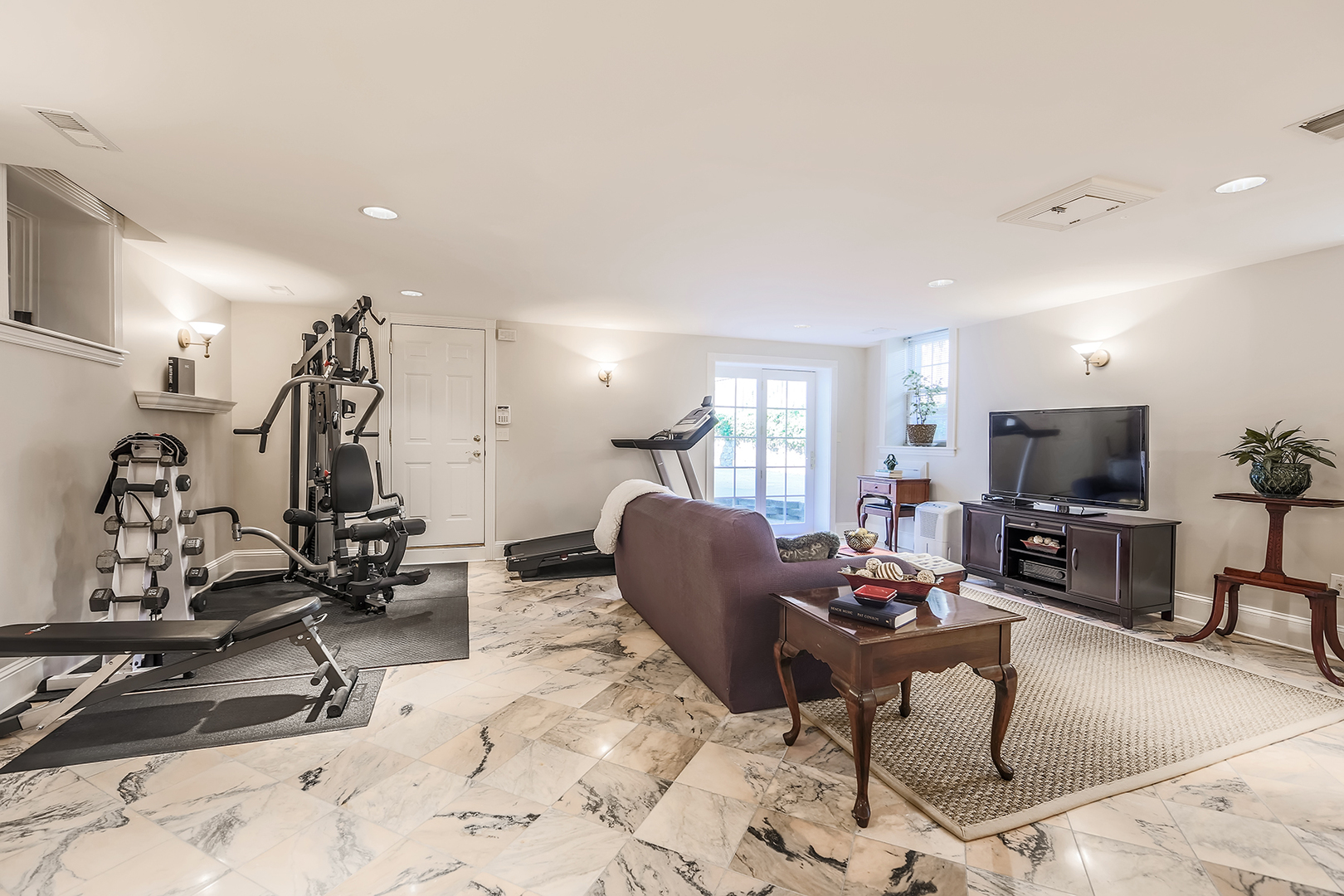 212 Stanley Avenue Park Ridge, IL 60068 - Photo 26 of 33 a living room with furniture a window and gym equipment
