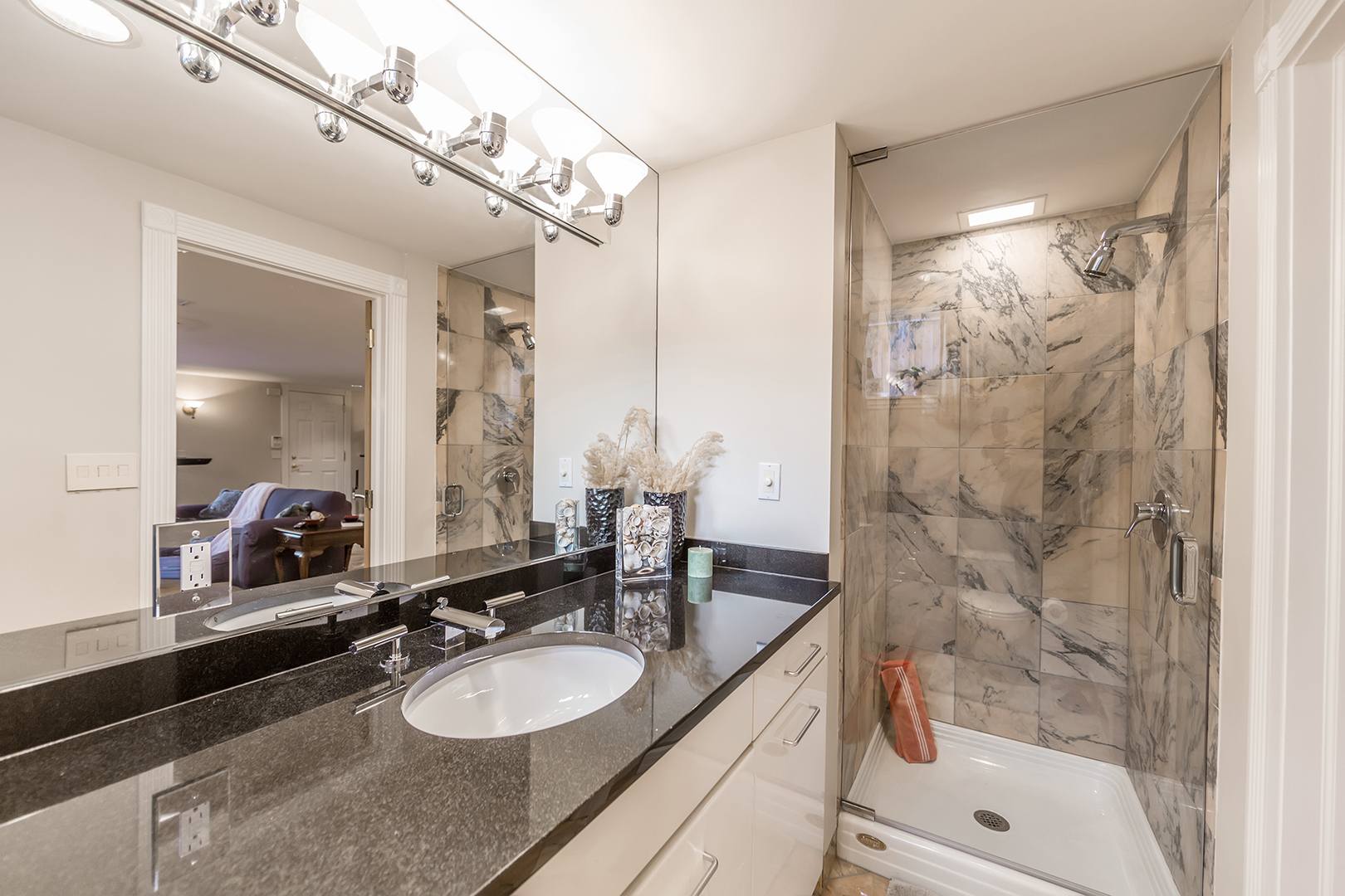 212 Stanley Avenue Park Ridge, IL 60068 - Photo 28 of 33 a bathroom with a granite countertop sink a mirror and a shower