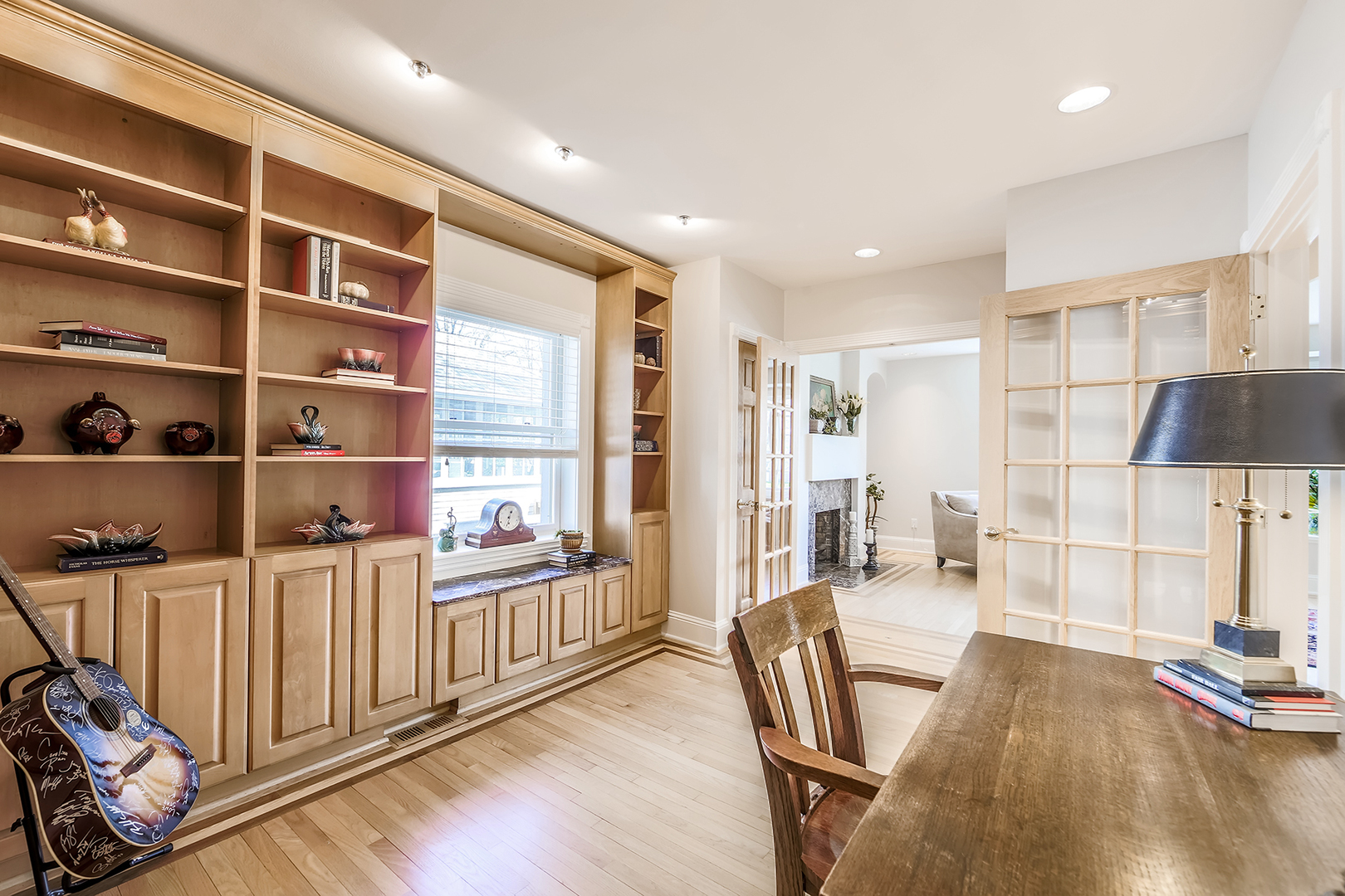 212 Stanley Avenue Park Ridge, IL 60068 - Photo 6 of 33 a living room with furniture a flat screen tv and a table