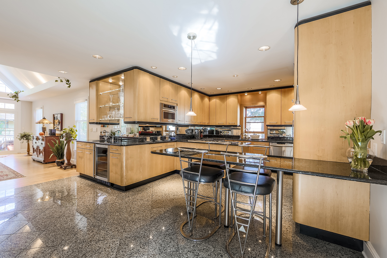 212 Stanley Avenue Park Ridge, IL 60068 - Photo 7 of 33 a kitchen with a table chairs stove and cabinets
