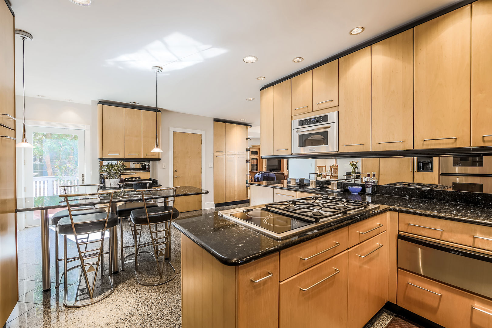 212 Stanley Avenue Park Ridge, IL 60068 - Photo 9 of 33 a kitchen with a stove a sink a refrigerator and cabinets