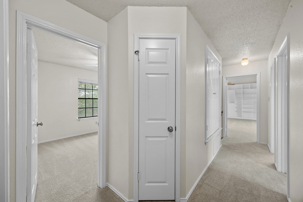1000 West Noton Street Pflugerville, TX 78660 - Photo 28 of 35 a view of a bathroom with a glass door shower