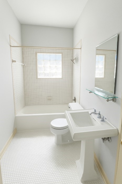 4716 Crawford Street Houston, TX 77004 - Photo 12 of 14 a bathroom with a sink a toilet and shower