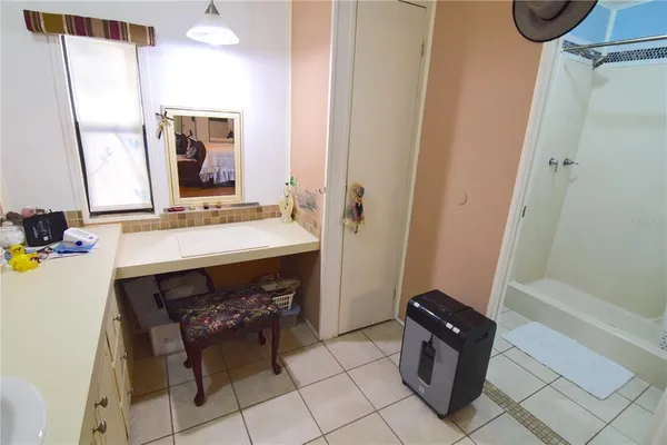 a room with table chair and dryer