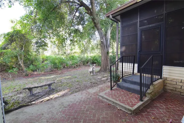 a view of backyard with green space