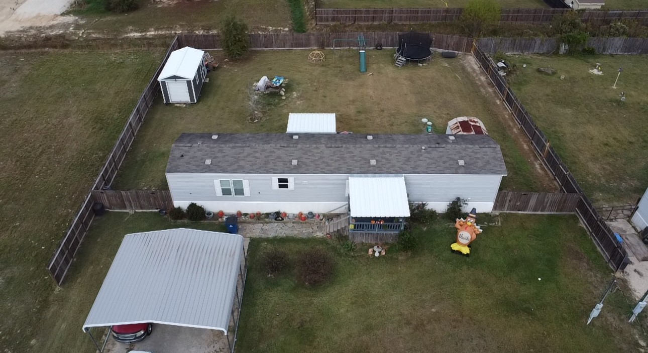 21625 County Road 3749D Cleveland, TX 77327 - Photo 2 of 20 an aerial view of a house with outdoor space