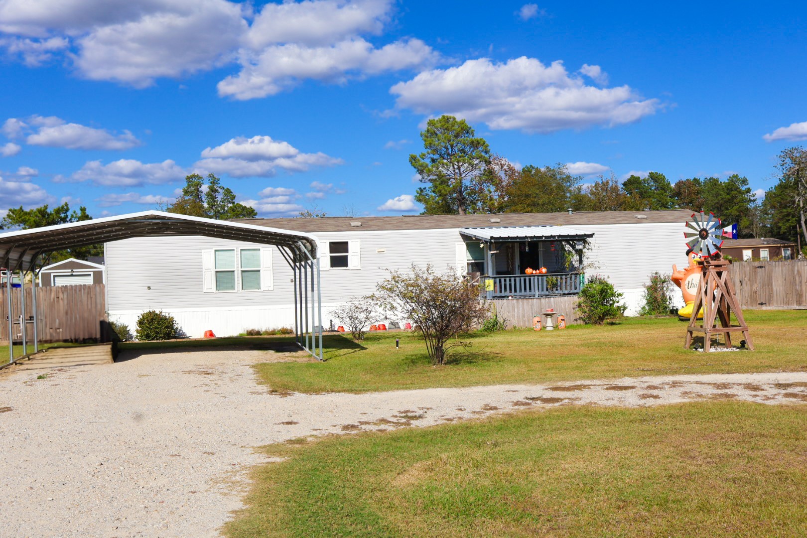 21625 County Road 3749D Cleveland, TX 77327 - Photo 3 of 20 a front view of a house with a ocean view