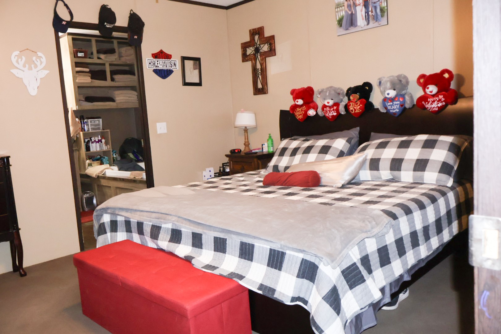 21625 County Road 3749D Cleveland, TX 77327 - Photo 8 of 20 a bedroom with a bed and dresser