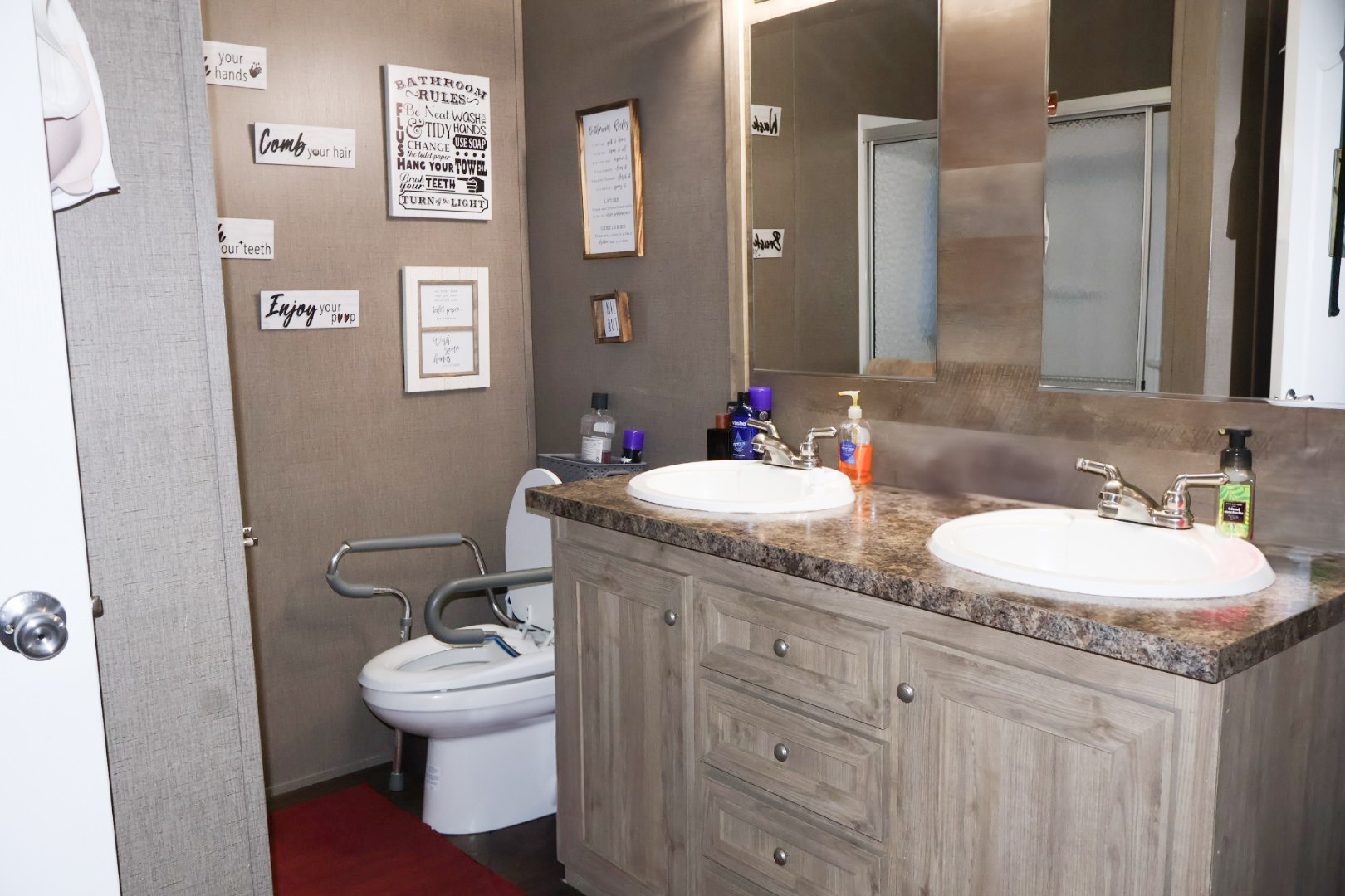 21625 County Road 3749D Cleveland, TX 77327 - Photo 10 of 20 a bathroom with a sink and a toilet