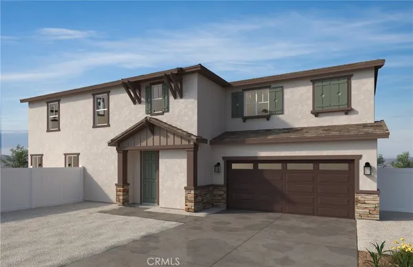 a front view of a house with a garage