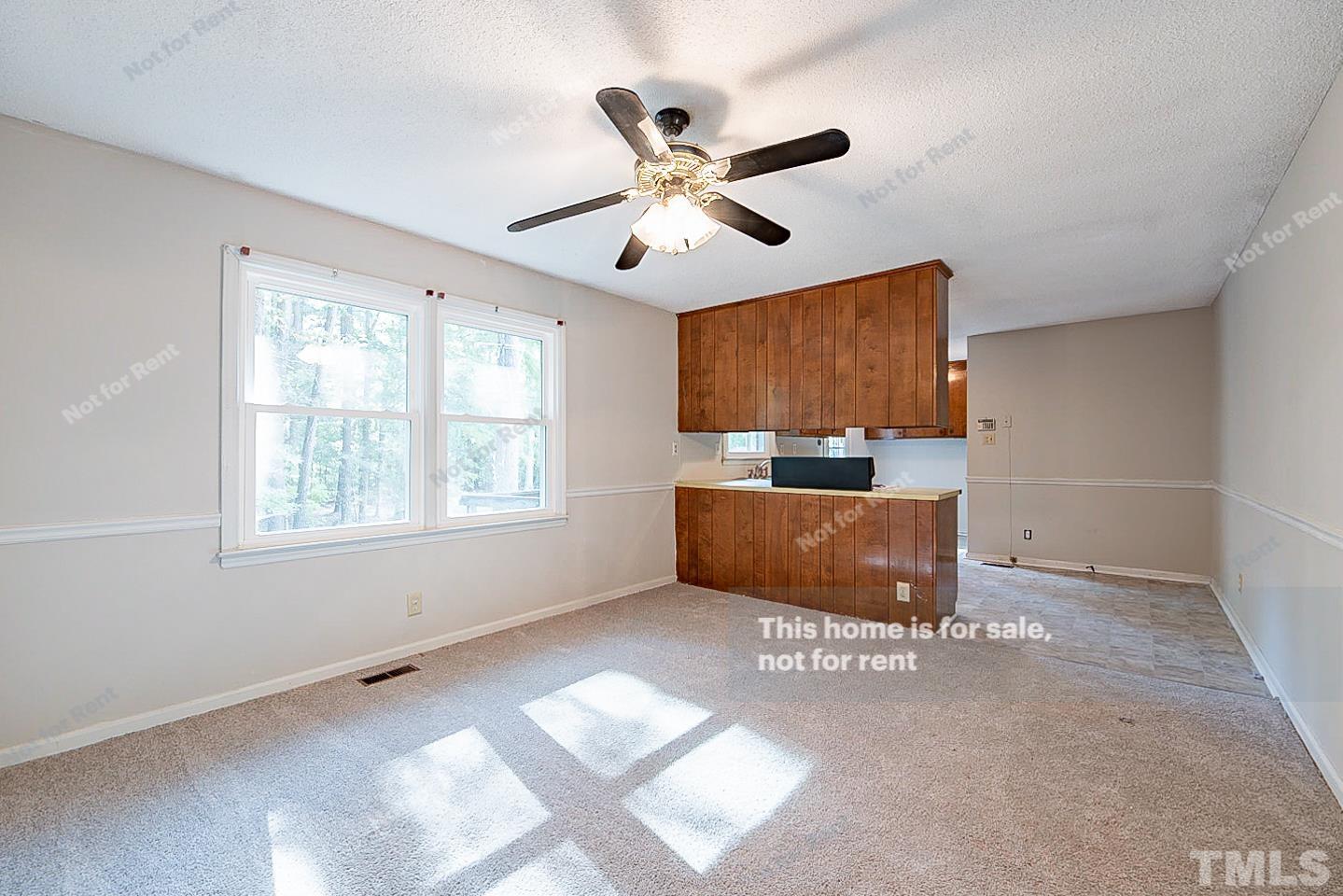 4903 Fayetteville Road Durham, NC 27713 - Photo 8 of 19 a view of workspace with window and ceiling fan
