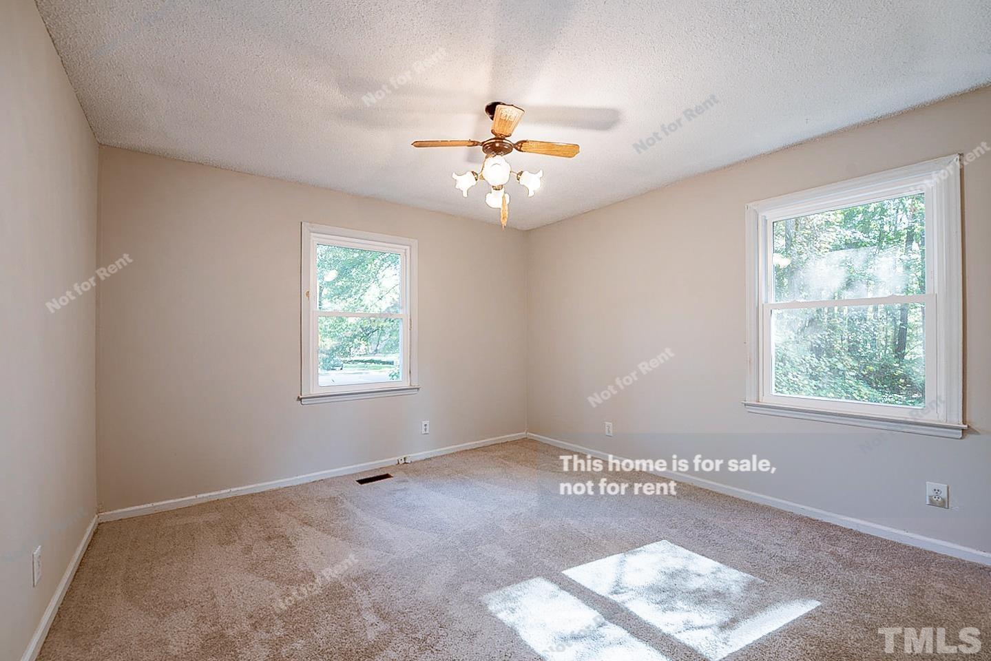 4903 Fayetteville Road Durham, NC 27713 - Photo 10 of 19 a view of an empty room with a window