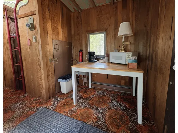 a room with furniture and a window