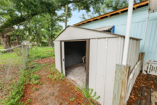 a view of a back yard of the house