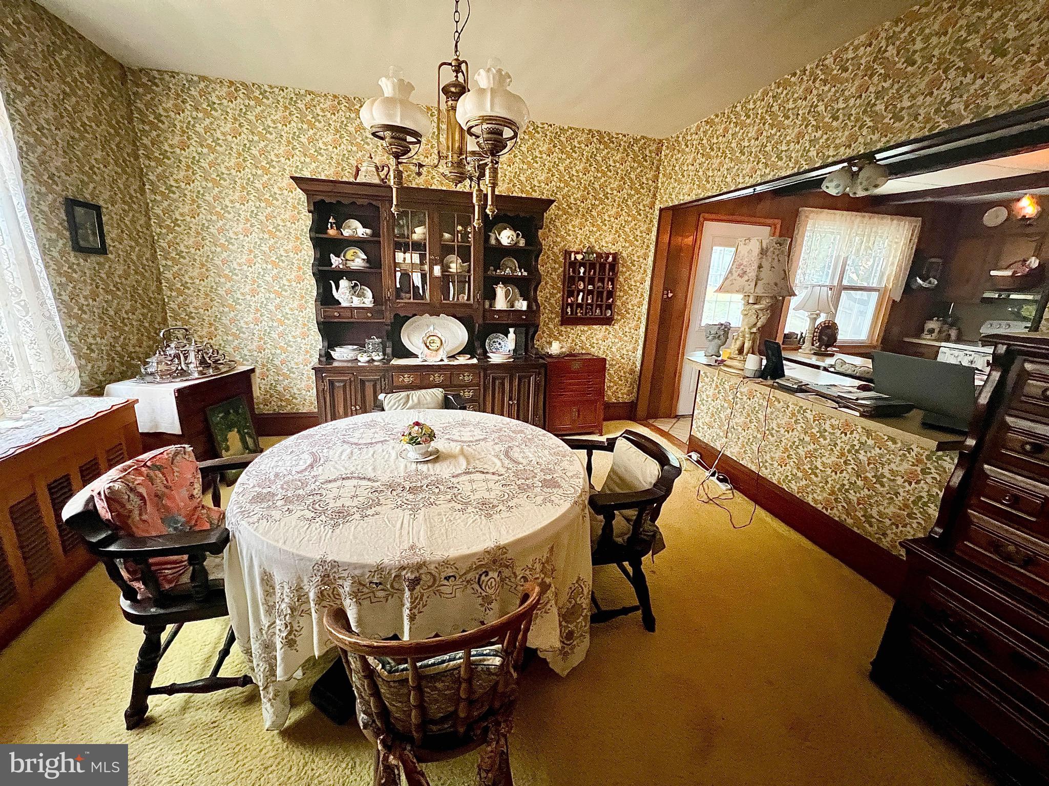992 Fountain Street Ashland, PA 17921 - Photo 11 of 46 a view of a dining room with furniture and chandelier