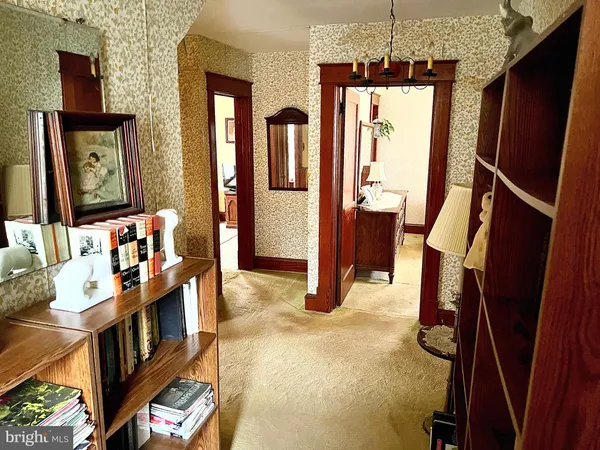 a view of an entryway with a chandelier