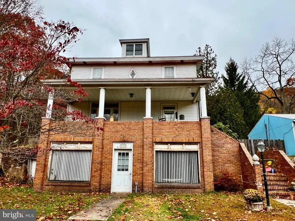 front view of a house with a balcony