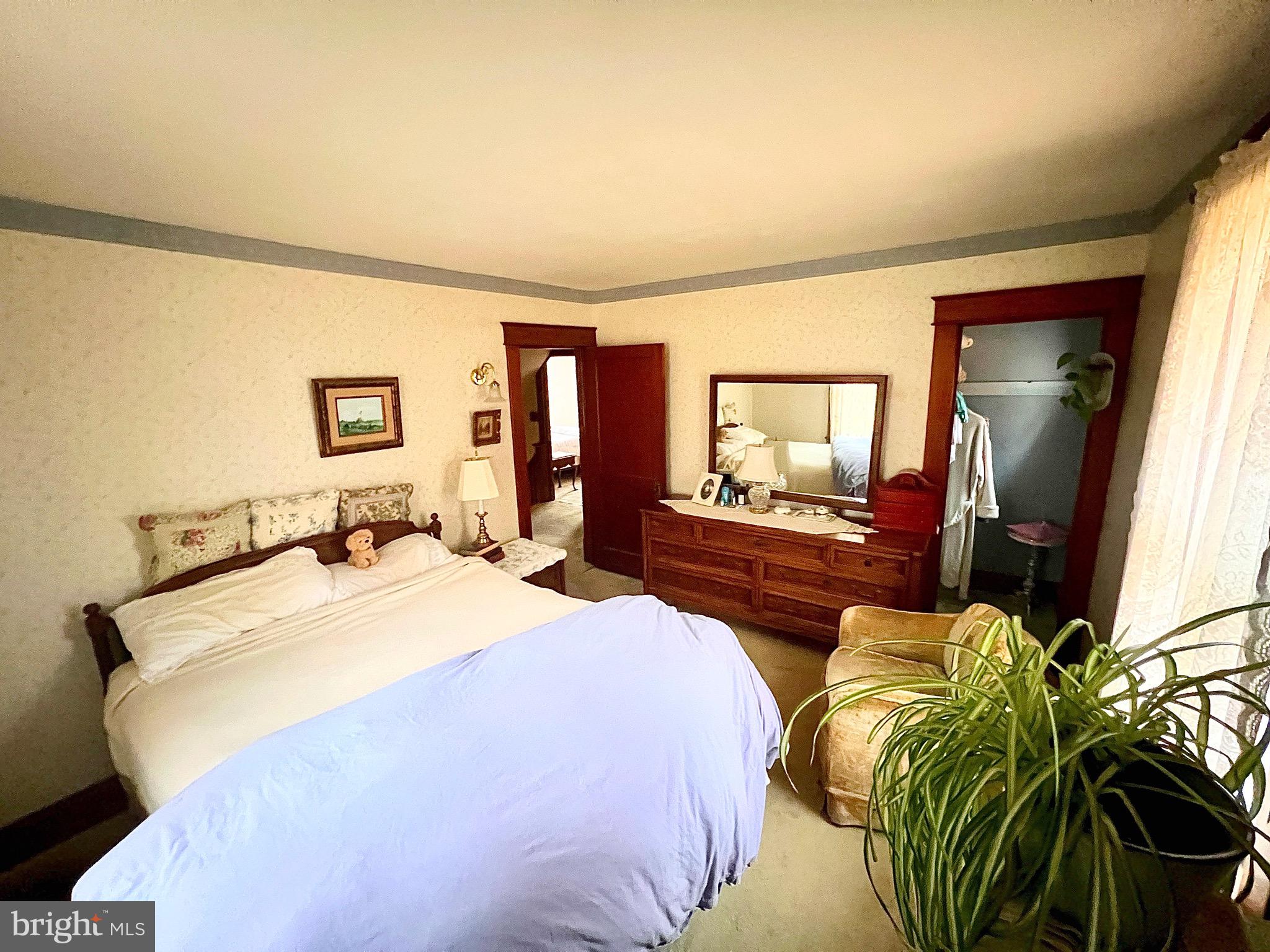 992 Fountain Street Ashland, PA 17921 - Photo 22 of 46 a bedroom with a bed and a flat screen tv