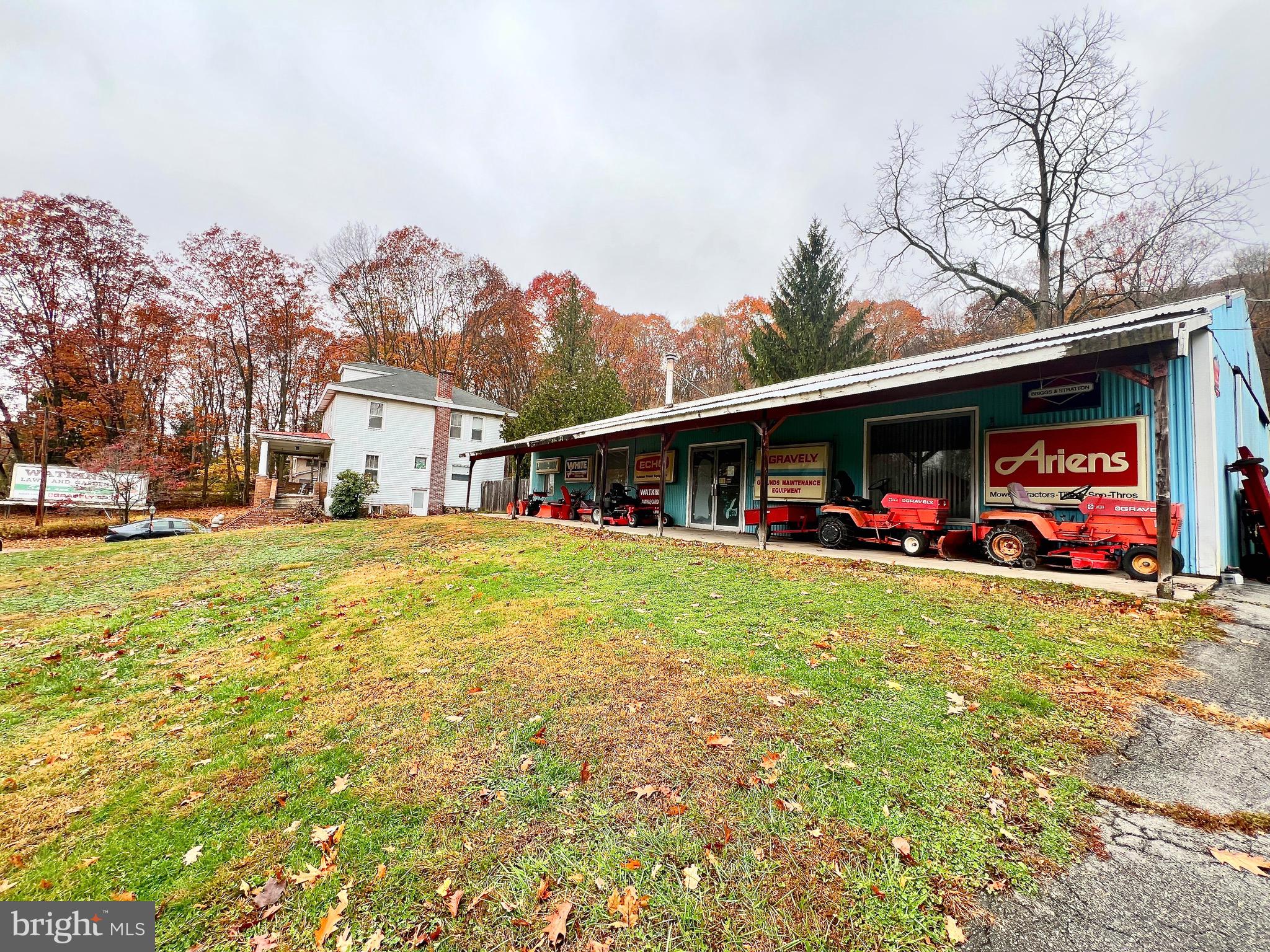 992 Fountain Street Ashland, PA 17921 - Photo 35 of 46 a front view of house with yard and trees in the background