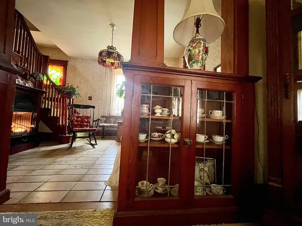 view of living room with furniture and chandelier