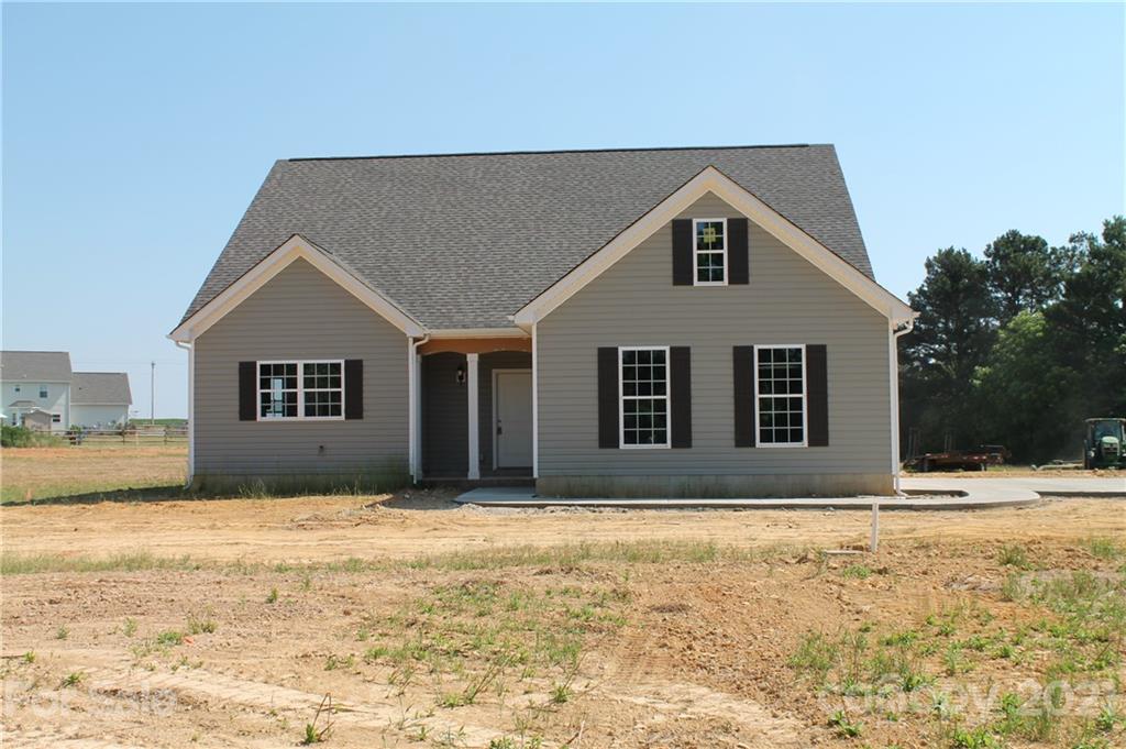 4809 Stack Road Monroe, NC 28112 - Photo 1 of 6 a front view of a house with a yard
