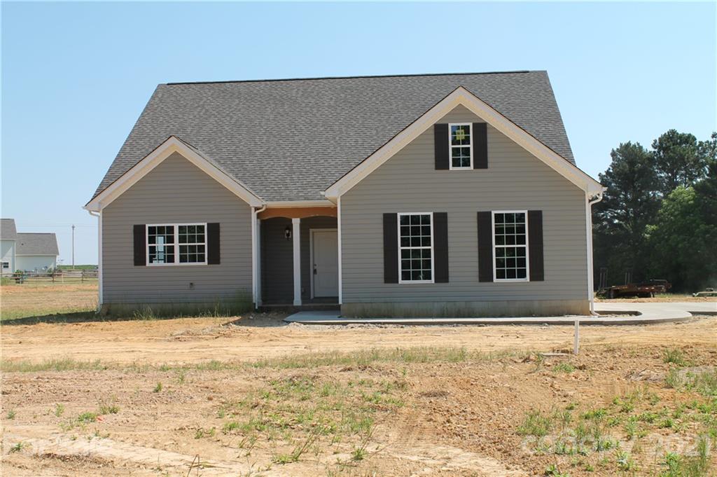 4809 Stack Road Monroe, NC 28112 - Photo 2 of 6 a front view of a house with a yard