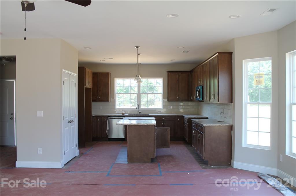 4809 Stack Road Monroe, NC 28112 - Photo 3 of 6 a kitchen with a sink cabinets and window
