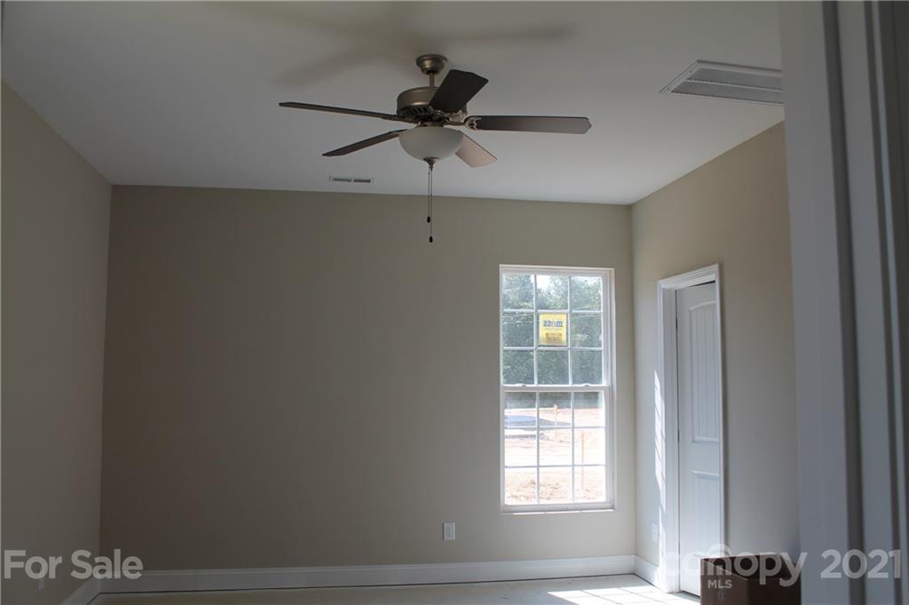 4809 Stack Road Monroe, NC 28112 - Photo 6 of 6 a view of a room that has a window in it