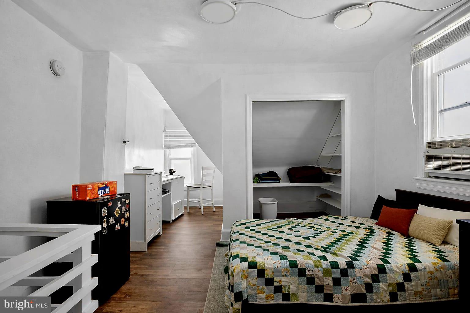 236 Kossuth Street Riverside, NJ 08075 - Photo 11 of 18 a bedroom with a bed and a dresser