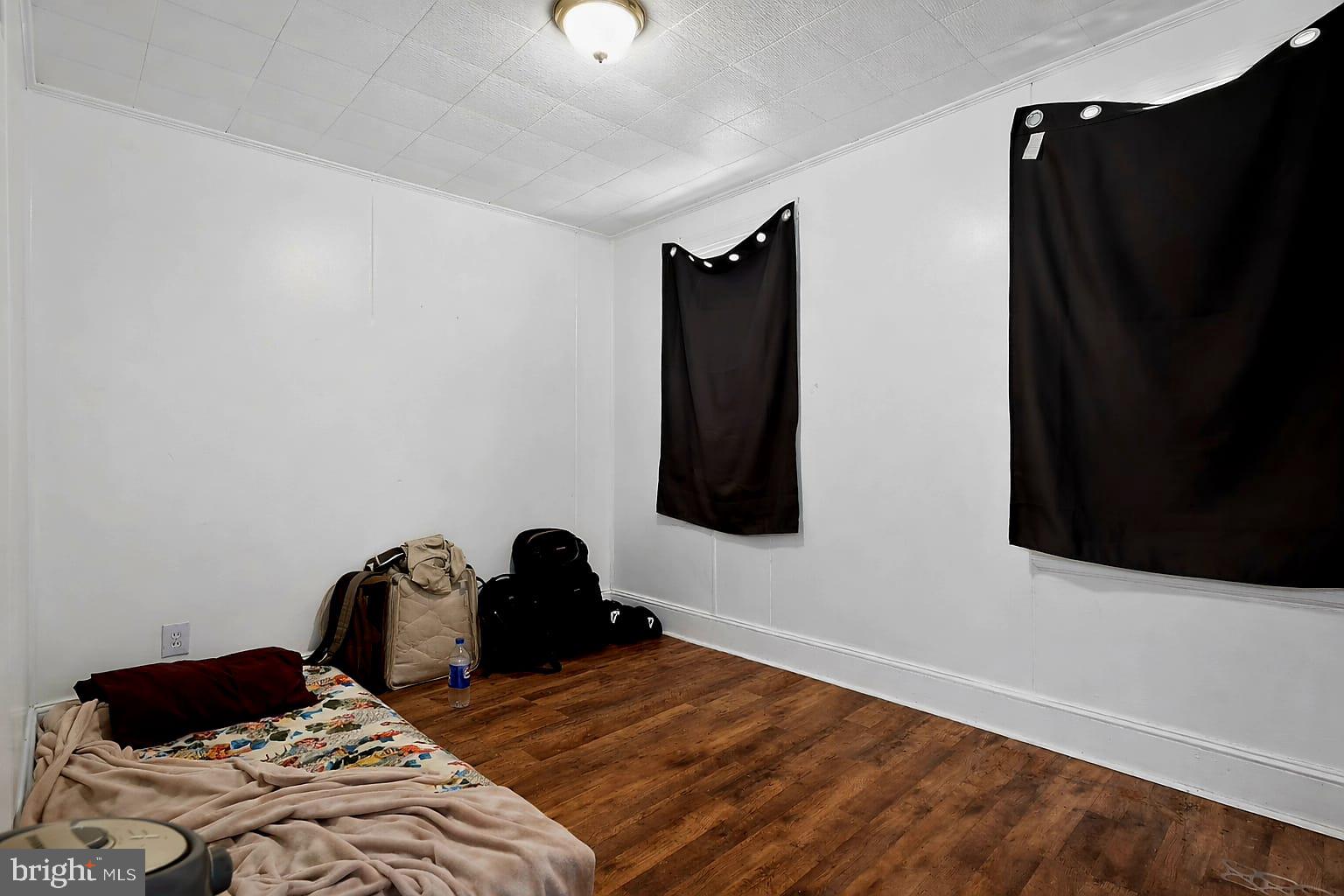 236 Kossuth Street Riverside, NJ 08075 - Photo 15 of 18 a bedroom with a bed and a window