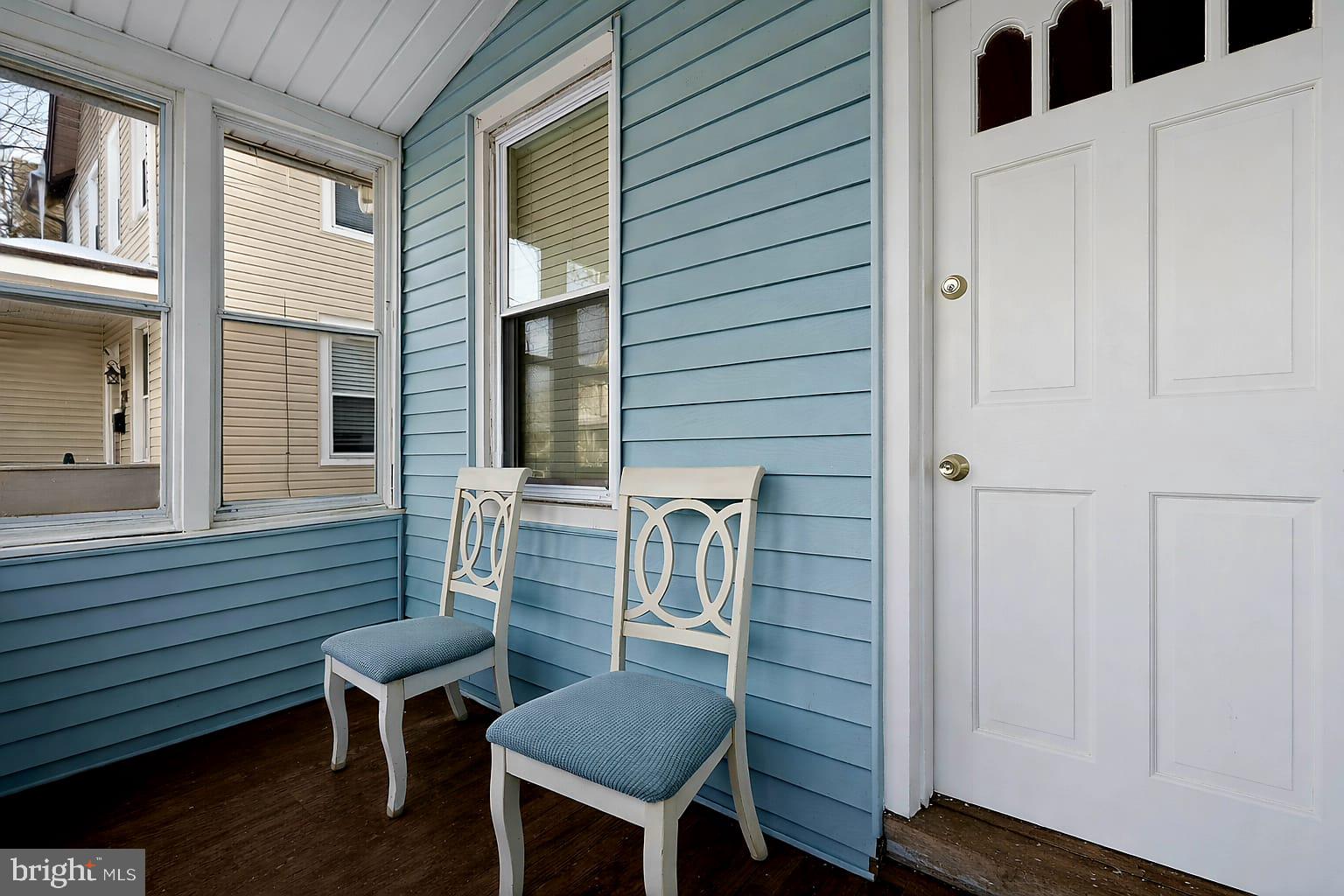 236 Kossuth Street Riverside, NJ 08075 - Photo 3 of 18 a view of a chair and table in the balcony