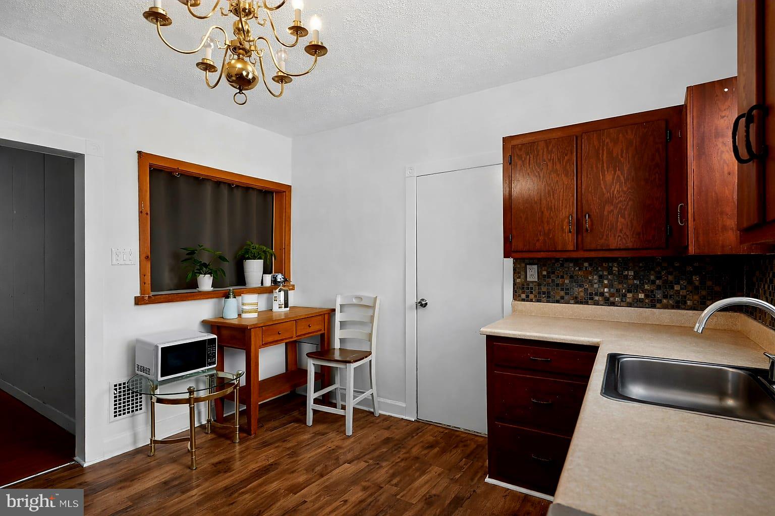 236 Kossuth Street Riverside, NJ 08075 - Photo 5 of 18 a view of a workspace with furniture