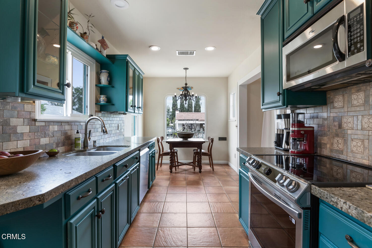 1419 Alpha Avenue Pasadena, CA 91104 - Photo 12 of 40 a kitchen with a stove a sink and a microwave