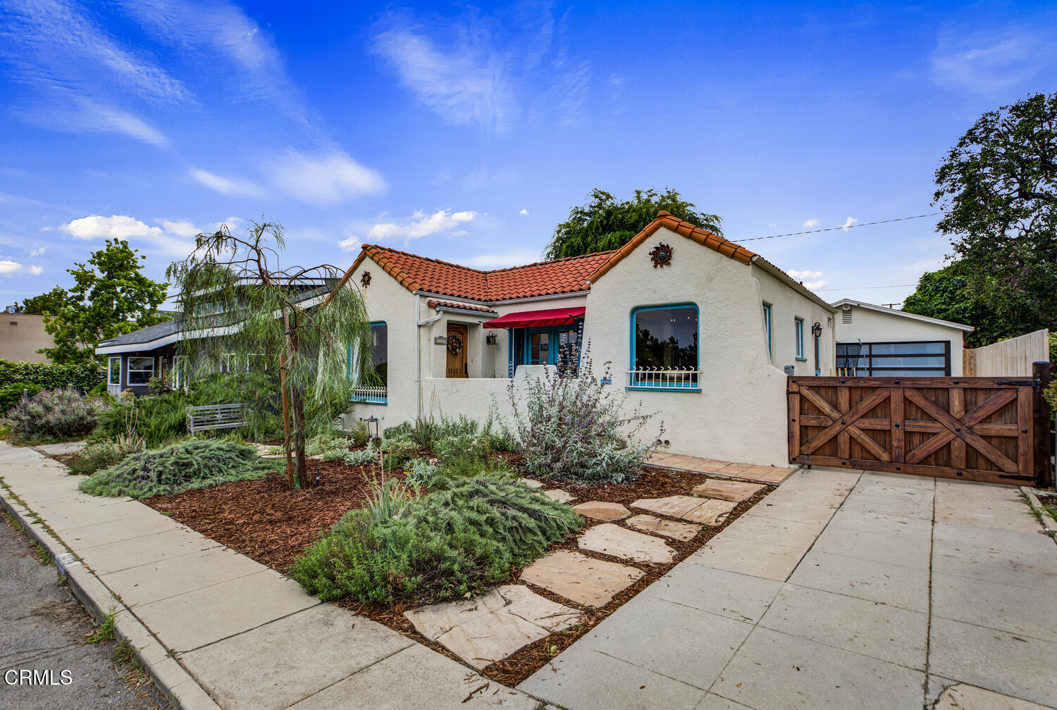1419 Alpha Avenue Pasadena, CA 91104 - Photo 2 of 40 a front view of a house with a garden