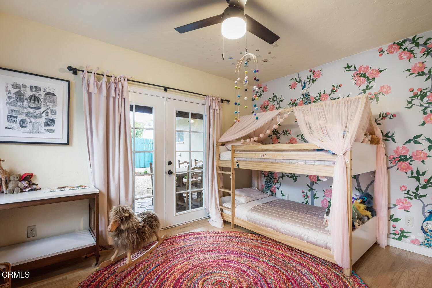 1419 Alpha Avenue Pasadena, CA 91104 - Photo 28 of 40 a bedroom with a bed and a chandelier