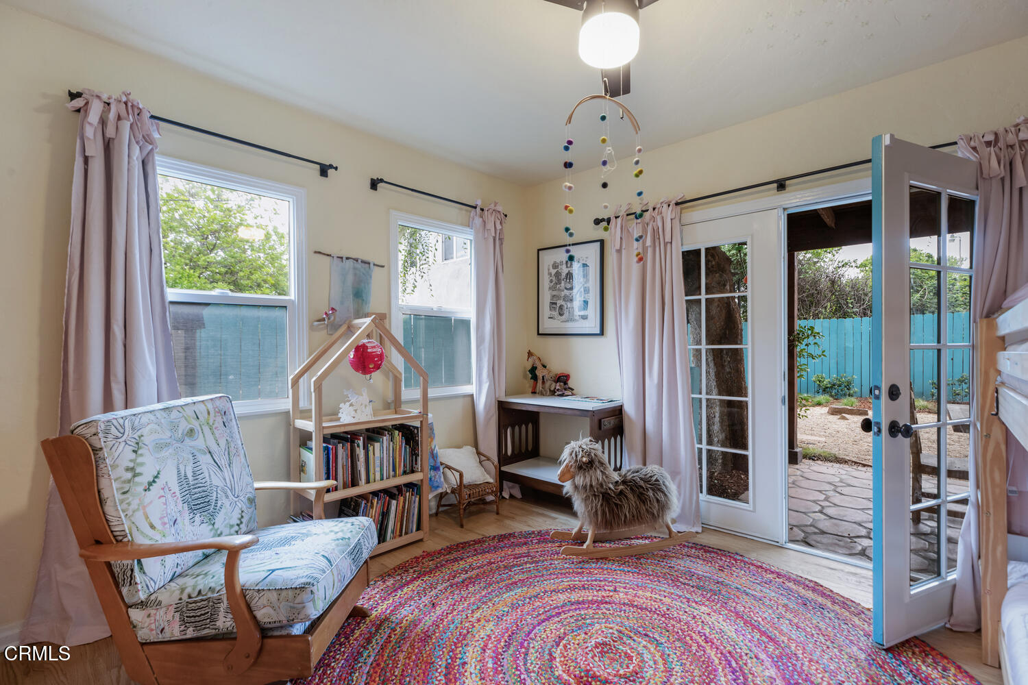 1419 Alpha Avenue Pasadena, CA 91104 - Photo 29 of 40 a living room with furniture a rug and a window