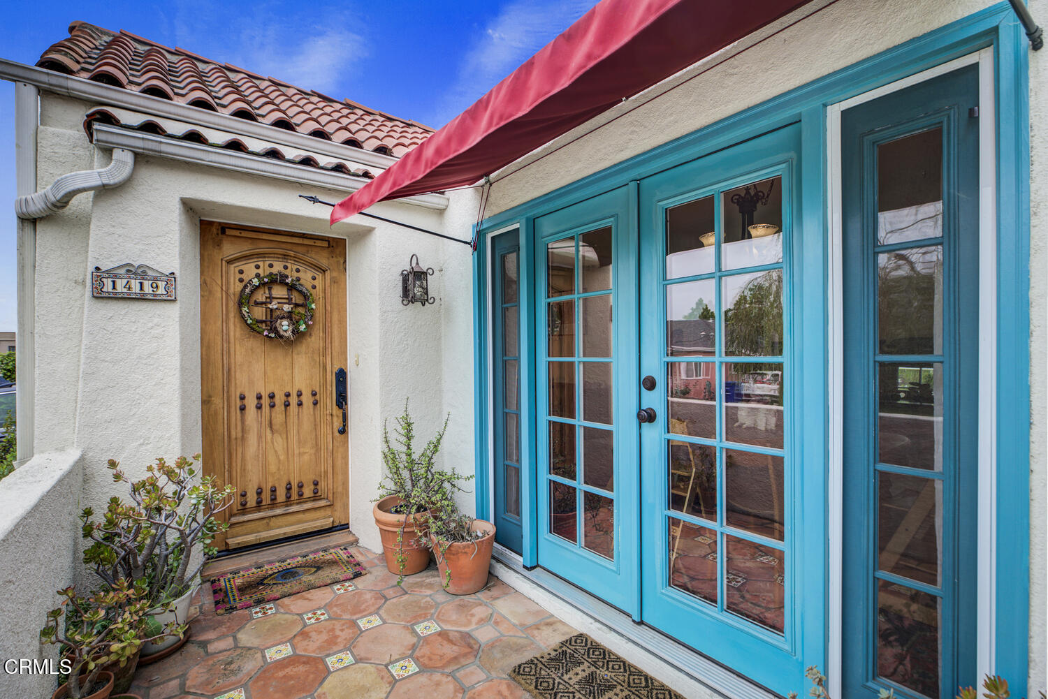 1419 Alpha Avenue Pasadena, CA 91104 - Photo 3 of 40 a front view of a house with a large window and a potted plant