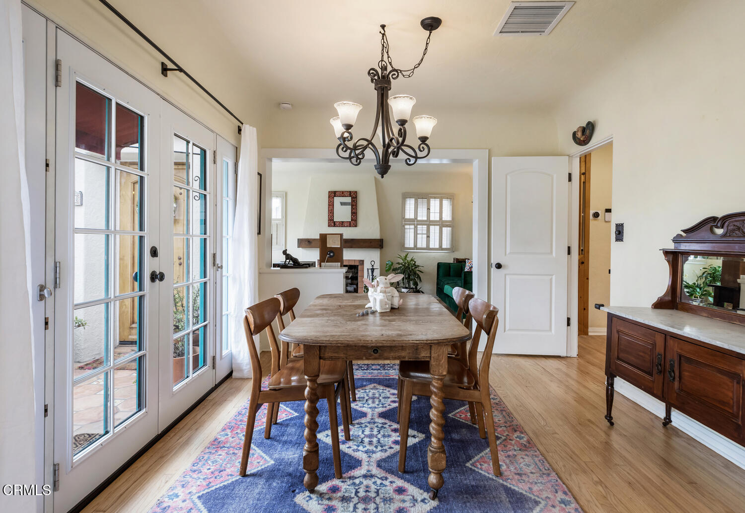 1419 Alpha Avenue Pasadena, CA 91104 - Photo 9 of 40 a view of a dining room with furniture window and wooden floor