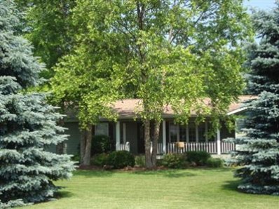 1699 North Rustic Drive La Porte, IN 46350 - Photo 3 of 10 a view of a house with a yard and plants