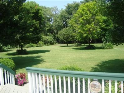 1699 North Rustic Drive La Porte, IN 46350 - Photo 8 of 10 a view of outdoor space with deck and yard