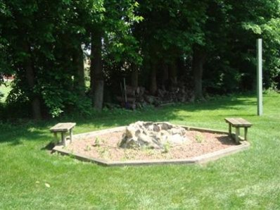1699 North Rustic Drive La Porte, IN 46350 - Photo 9 of 10 a view of a backyard with a fountain